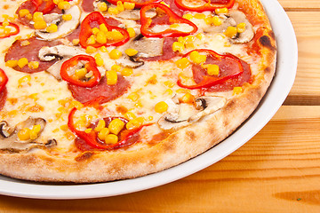 Image showing A Pepperoni pizza with corn