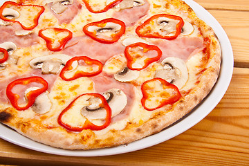 Image showing Pepperoni pizza with mushrooms