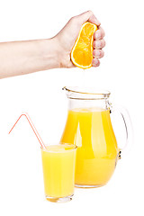 Image showing orange juice pouring into glass
