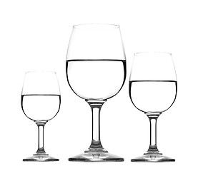 Image showing three glass of water half empty isolated
