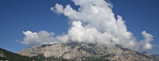 Image showing Mountains in clouds.