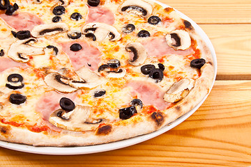 Image showing Appetizing pizza with mushrooms