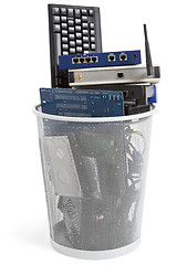 Image showing electronic scrap in trash can