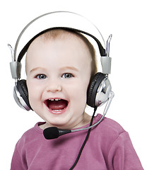 Image showing young child with headset