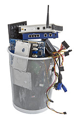 Image showing electronic scrap in trash can