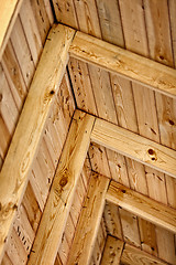 Image showing Construction a wooden roof - inside view