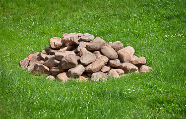 Image showing Pile of stones on field