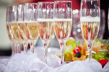 Image showing glasses of champagne on festive table