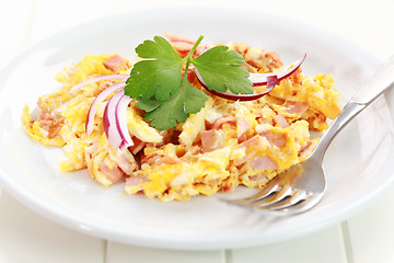 Image showing Scrambled eggs with ham and onion