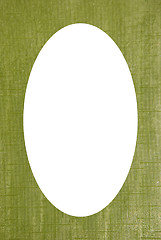 Image showing Isolated white oval in old book cover texture 