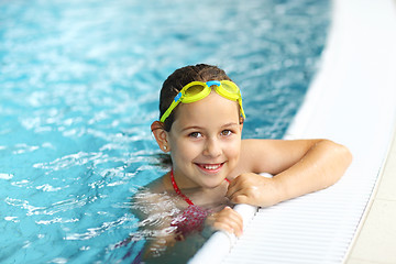 Image showing Girl with goggles in swimming pool