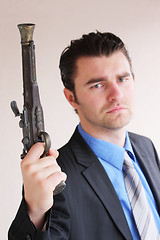 Image showing Businessman with a handgun