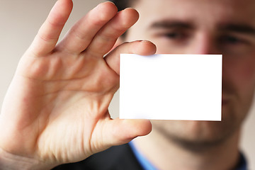 Image showing man shows his business card