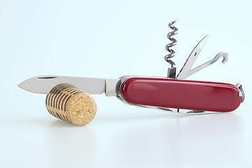 Image showing Penknife and cork