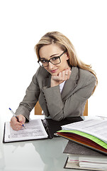 Image showing young successful business woman in the office