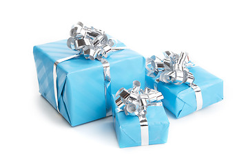 Image showing colorfull gift present with shiny ribbons isolated