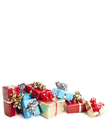 Image showing colorfull gift present with shiny ribbons isolated