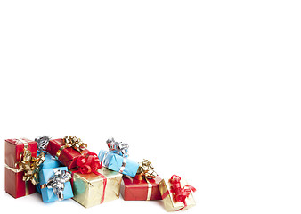 Image showing colorfull gift present with shiny ribbons isolated