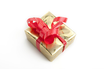 Image showing colorfull gift present with shiny ribbons isolated