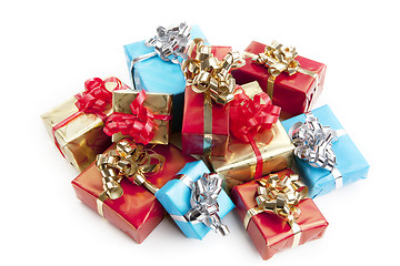 Image showing colorfull gift present with shiny ribbons isolated