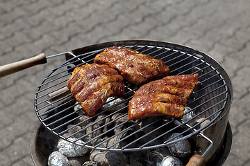 Image showing barbecue grill wiht meat outside in summer