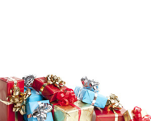 Image showing colorfull gift present with shiny ribbons isolated