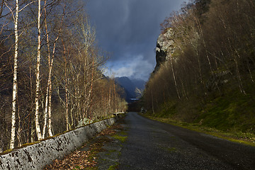 Image showing run-down road in rural landscape