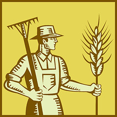 Image showing Farmer With Rake and Wheat Woodcut