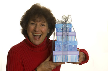 Image showing happy woman with gifts stack