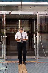 Image showing Man With Notebook