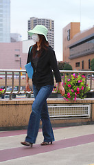 Image showing Japanese woman in a city