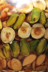 Image showing honey with fruit pieces