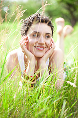 Image showing girl on green field 