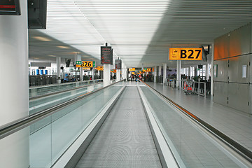 Image showing AMSTERDAM - APRIL 14: Passengers move around the terminal at Ams
