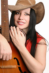 Image showing Female musician with her guitar