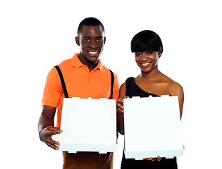 Image showing Beautiful young couple with pizza boxes