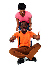 Image showing Couple showing double thumbs-up to camera