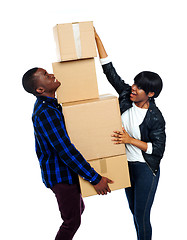 Image showing Teenage couple with cardboard boxes