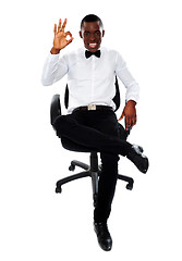 Image showing African corporate man showing okay gesture