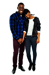 Image showing African young couple holding hands