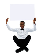 Image showing Man pointing towards blank billboard. Copyspace