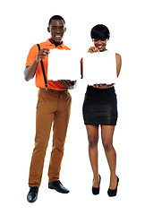 Image showing Attractive african couple with pizza boxes