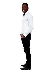 Image showing Full length view of smart young man. Side pose