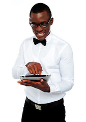 Image showing Smiling african boy using tablet-pc