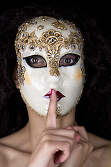 Image showing Woman wearing a beautiful venetian mask