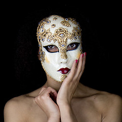 Image showing Portrait of a a woman wearing a beautiful carnival mask