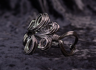 Image showing Twisted bracelet made â€‹â€‹of black metal