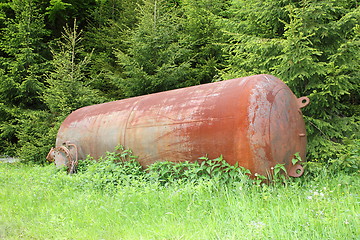 Image showing rusty cauldron left in the woods