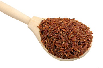 Image showing red rice on wooden spoon