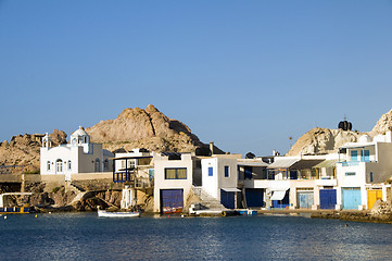 Image showing  houses built into rock cliffs on Mediterranean Sea Firopotamos 